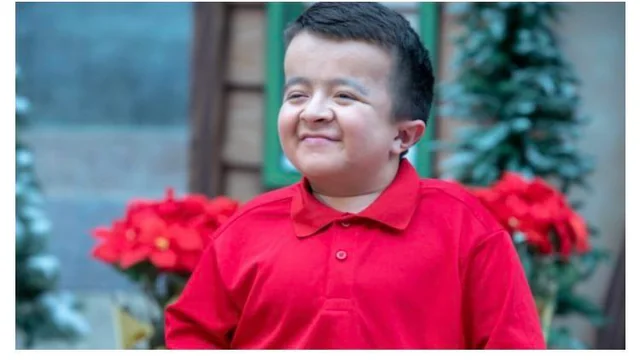 how old is caleb on the shriners commercial